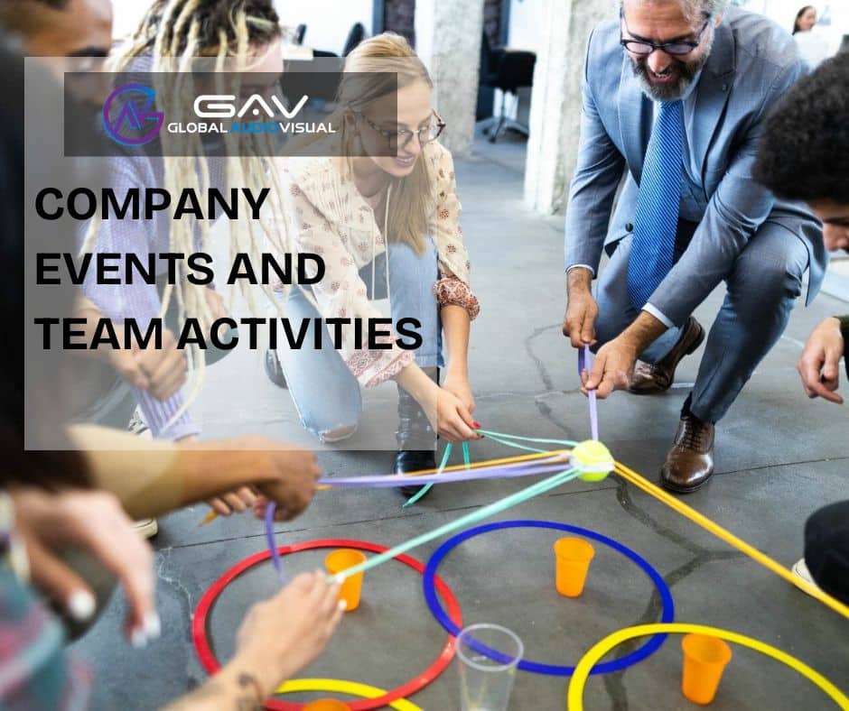 Interactive Displays & Touchscreens at an event booth with people engaging in games, presentations, and team activities.