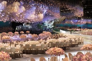 Trendy Wedding Themes and Decor Ideas setup featuring floral arrangements, immersive experiences, and high-end event audio visual production.