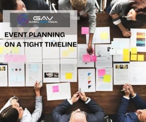 Event planner organizing a corporate event on a tight timeline using digital tools and AV equipment